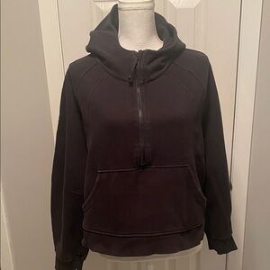 Lulu Lemon Size XL BUT CAN EASILY FIT A LARGE HOODIE 1/2 ZIP. NICE USED